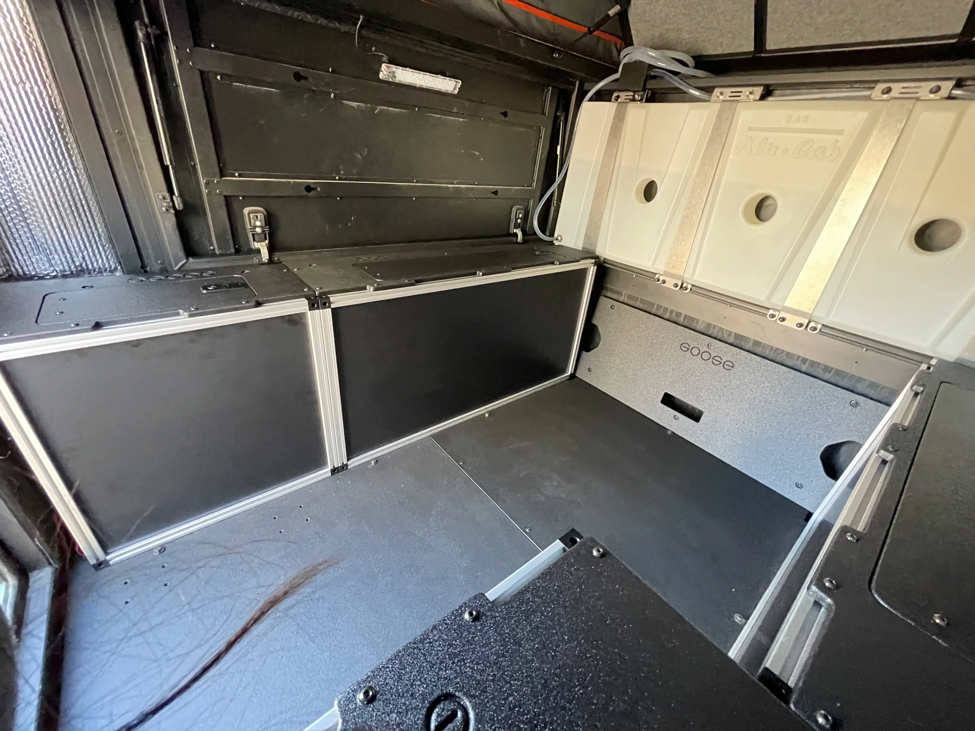 Alu-Cab Canopy Camper V2 - Toyota Tacoma 2005-2023 - Front Utility Module - 6' Bed - Image 3
